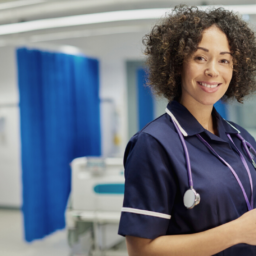 Nurse smiling at camera NHS