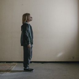 Boy looking at door