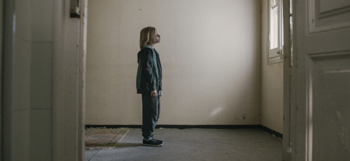 Boy looking at door