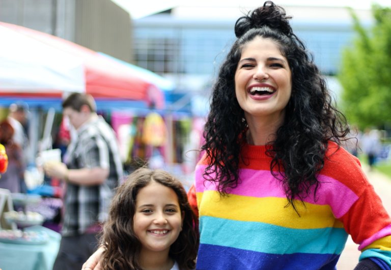 Woman and child in colourful outfits