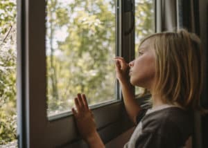 VR film still image - Boy looking through window