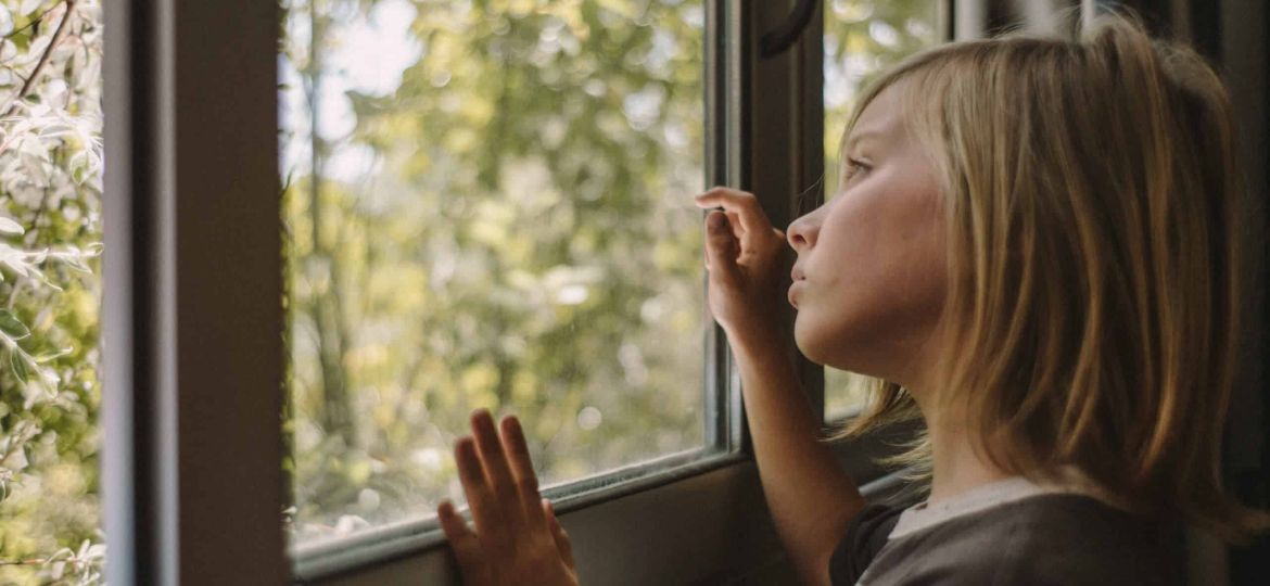 VR film still image - Boy looking through window