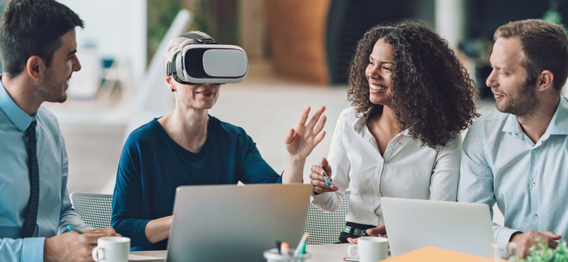 Business persons enjoying a virtual reality presentation